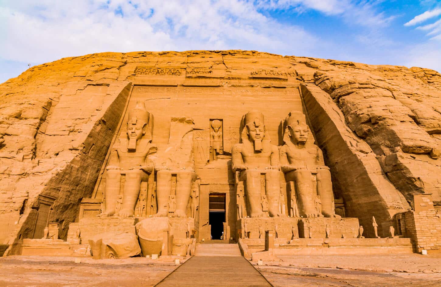 The facade of Abu Simbel temple with the four colossi of Ramesses II — 14-day Cairo to Sharm itinerary